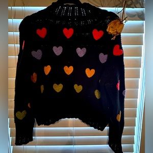 Beautiful black Anthropologie sweater with  ❤️💛💜💚 hearts.